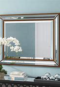 Image result for Mirror On Wall Stock Image