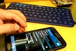 Image result for Keyboard Bluetooth for iPhone 5