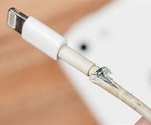 Image result for Metal Cords Coming From iPhone Charging Cable