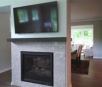 Image result for 70 Inch TV above Fireplace