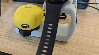 Image result for iTouch Wearable Sport Watch Charger