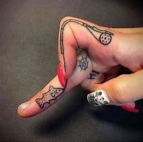 Image result for Ring Finger Tattoo Cover Up with Fishing Hook