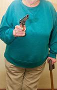 Image result for Elderly Woman with Gun