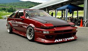 Image result for Auto-Tuned Red Toyota Corolla