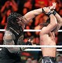 Image result for WWE Seth Rollins and Roman Reigns