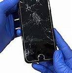 Image result for Tiny Circular Crack On iPhone Screen