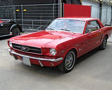Image result for  cherry red mustangs