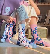 Image result for A Woman Wearing Mismatched Socks
