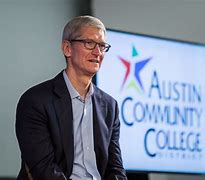 Image result for Tim Cook with MacBook