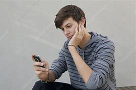 Image result for Boy Holding a Phone