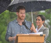 Image result for Harry and Meghan in the Rain
