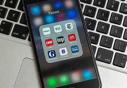 Image result for iPhone with News Media Logos Coming Out of It
