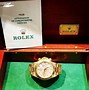 Image result for Rolex Daytona Gold Watch