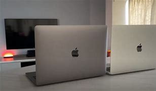 Image result for MacBook Pro 14 Space Grey vs Silver Day Night