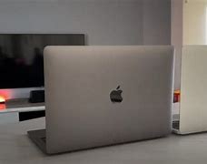 Image result for Spay Gray vs Silver MacBook
