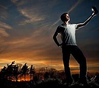 Image result for Holding Up a Camera Flash