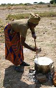 Image result for Garifuna Woman Cooking On an Open Fire