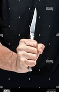 Image result for Man Holding Large Knife