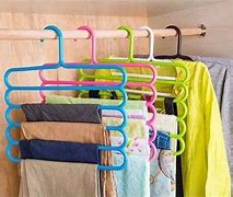 Image result for Plastic Pant Hangers with Clips