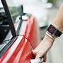 Image result for Apple Watch On Wrist with People in Background