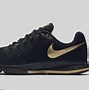 Image result for Nike Black Gold Trainers