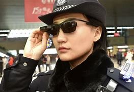 Image result for Chinese Police Officer with Facial Recognition