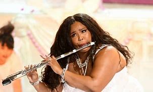 Image result for Singer Who Plays Flute