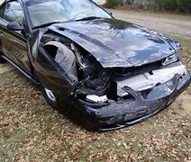 Image result for wrecked black mustang