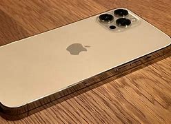 Image result for iPhone 14 Pro Beige with Gold Stones