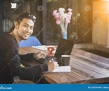Image result for people write on papers with computer