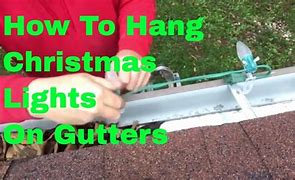 Image result for Hanging Christmas Lights On Gutters