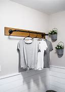 Image result for Homemade Wall to Wall Clothes Rack