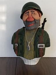 Image result for Soldier Caricature Wood Carving