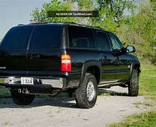 Image result for 2003 Black Chevrolet Suburban