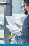 Image result for Person Looking at Paper