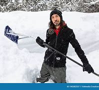 Image result for Man Holding Snow Shovel