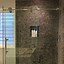 Image result for Pebble Tile Shower
