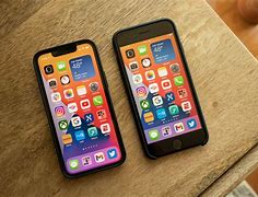 Image result for iPhone 13 Mini Next to iPhone 7 Plus