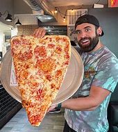 Image result for World's Biggest Slice of Pizza
