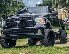 Image result for Ram 1500 4x4 Lifted Hevy Duty White and Black