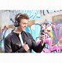 Image result for Motorola Over the Ear Earbuds