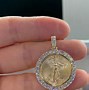 Image result for A Gold Coin Pendant with Rabbit and Sheep