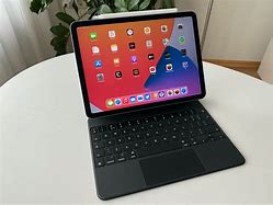 Image result for iPad Air with Magic Keyboard and Pencil