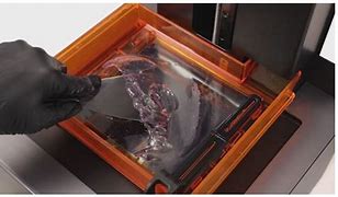 Image result for Solid Material On the Bottom of a Form 2 3D Printer Tank