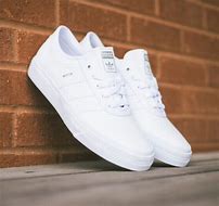 Image result for White Adidas Sneakers with Black Logo