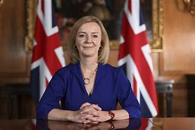Image result for Liz Truss Red Top