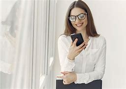 Image result for Woman Looking at Mobile Phone