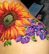 Image result for Cardi B Tattoo Thigh Roses