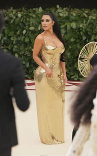Image result for Kim Kardashian Gold Skirt