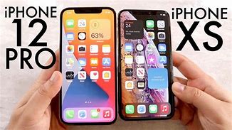 Image result for Size 13 Foot Next to iPhone XS